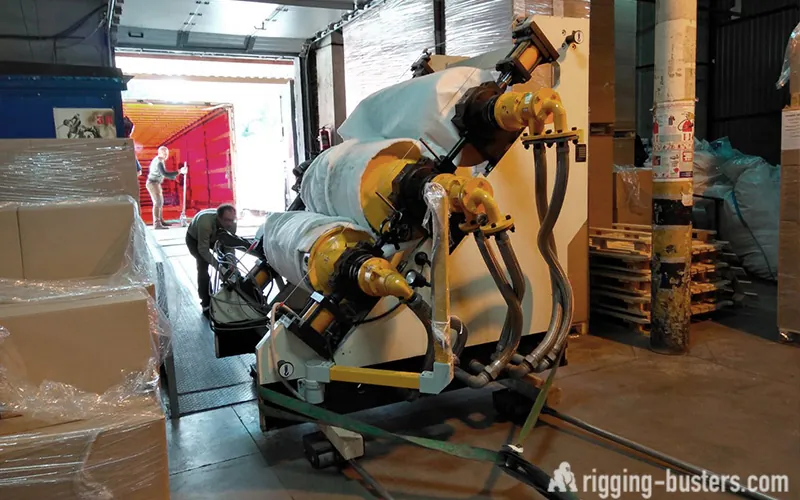 Roll-converting machine being moved out to a truck
